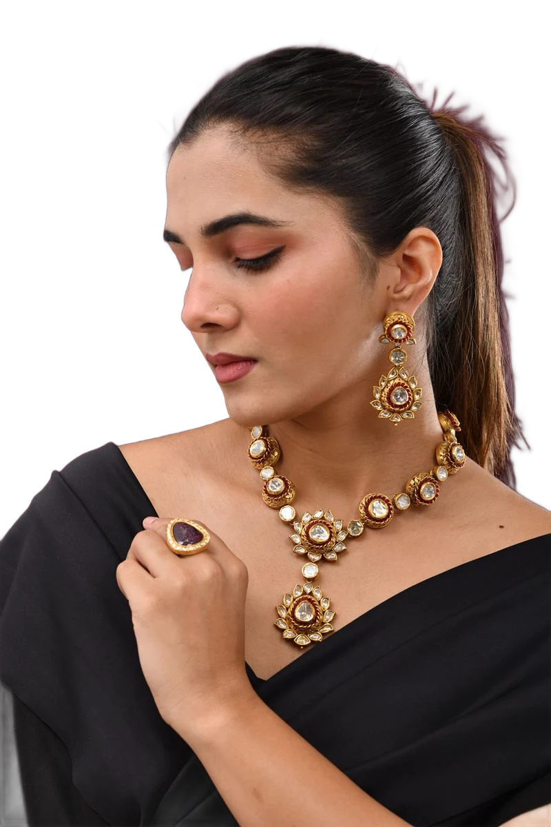 Kundan polki necklace worn with ring and earrings